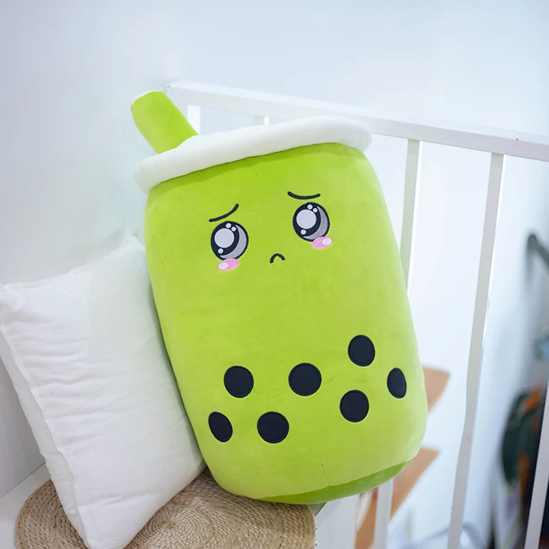 Image showing a green matcha bubble tea with a sad crying face and seven tapioca bobas