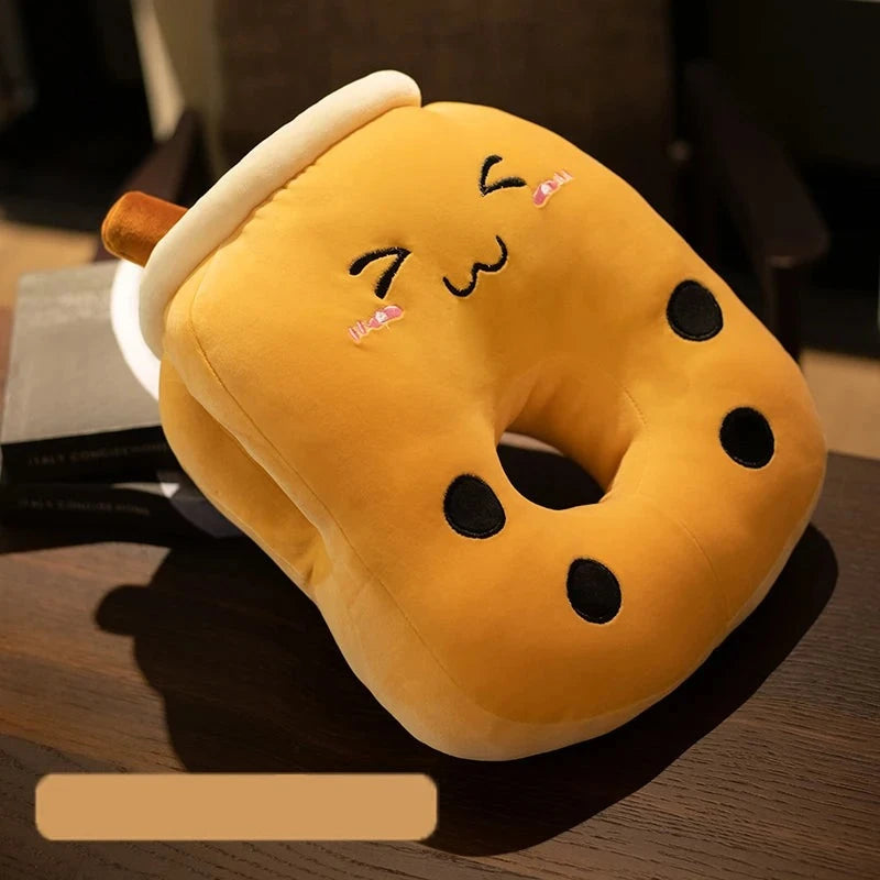 A cute grinning boba milk tea brown sugar flavor with a center hole and two side holes.
