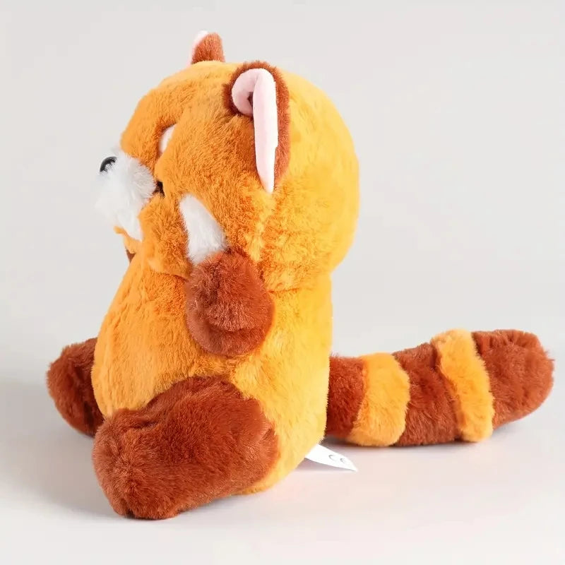 An image of Rocky the Raccoon Plushie Stuffed Animal from the left side