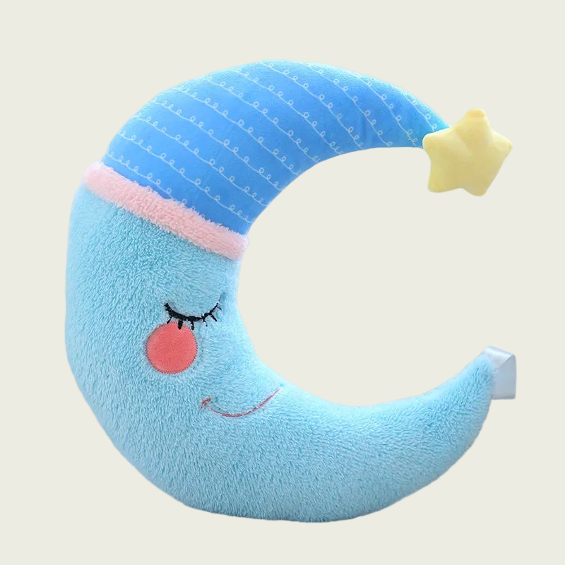 Plush toy shaped like a blue crescent moon with a face on a white background