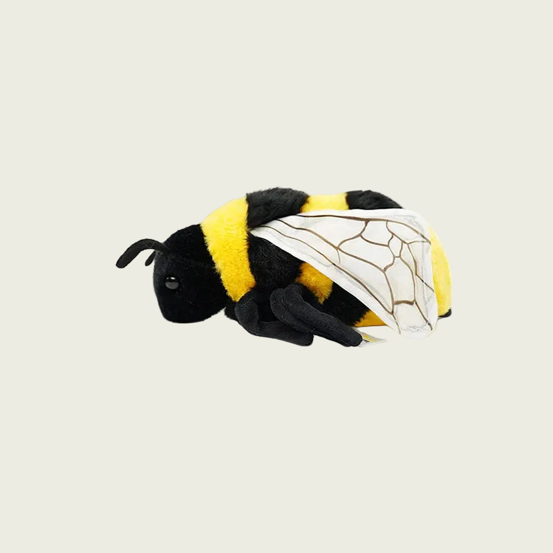 Plush bee toy with black and yellow colors on a white background